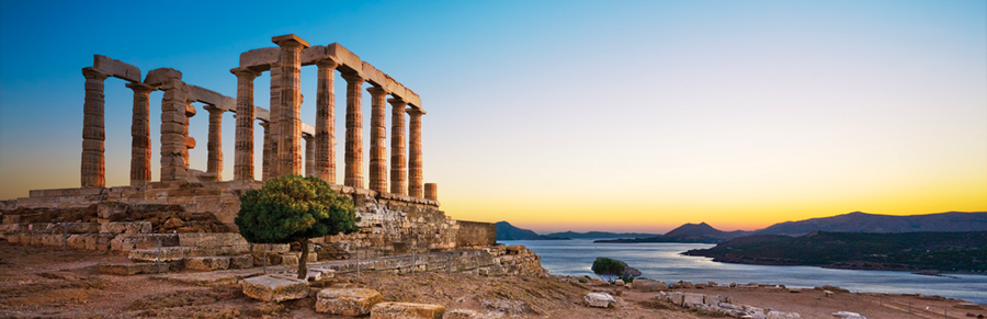 Greece. Cape Sounion - Ruins of an ancient Greek temple of Poseidon after sunset