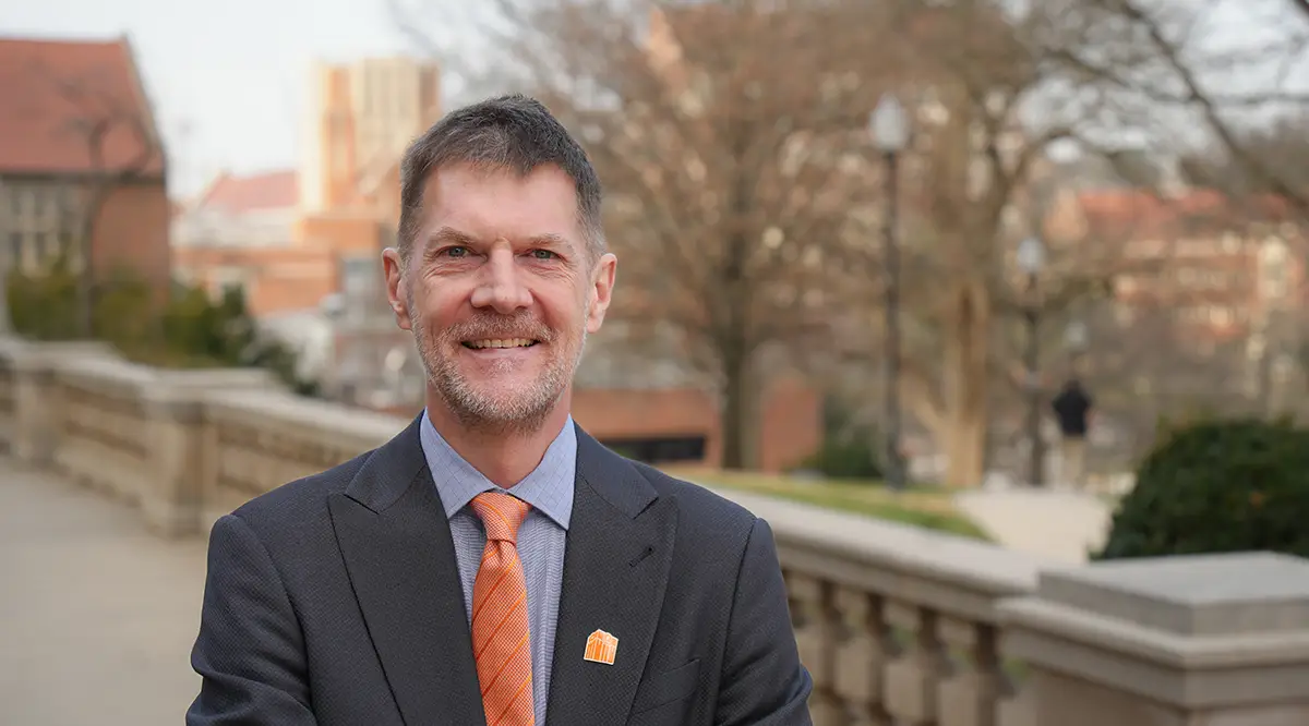 Robert Hinde poses for an outdoor photo on campus