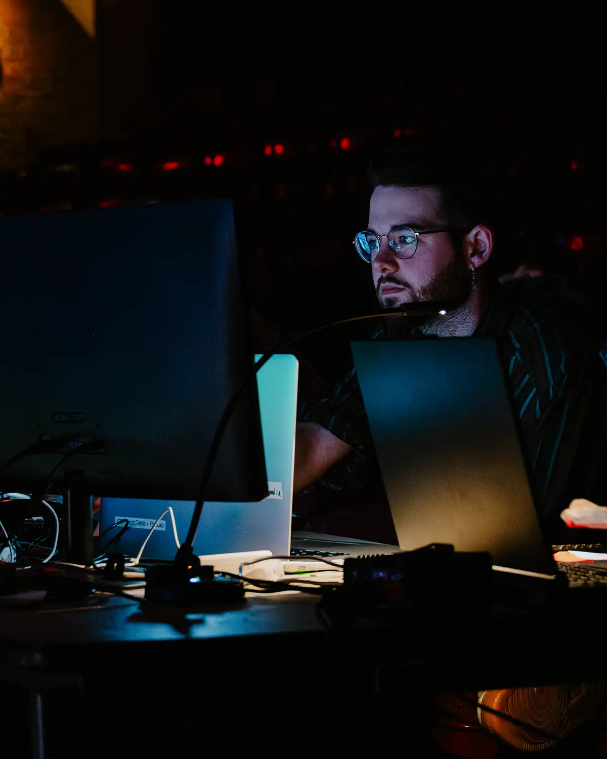 A crew member looking at a computer