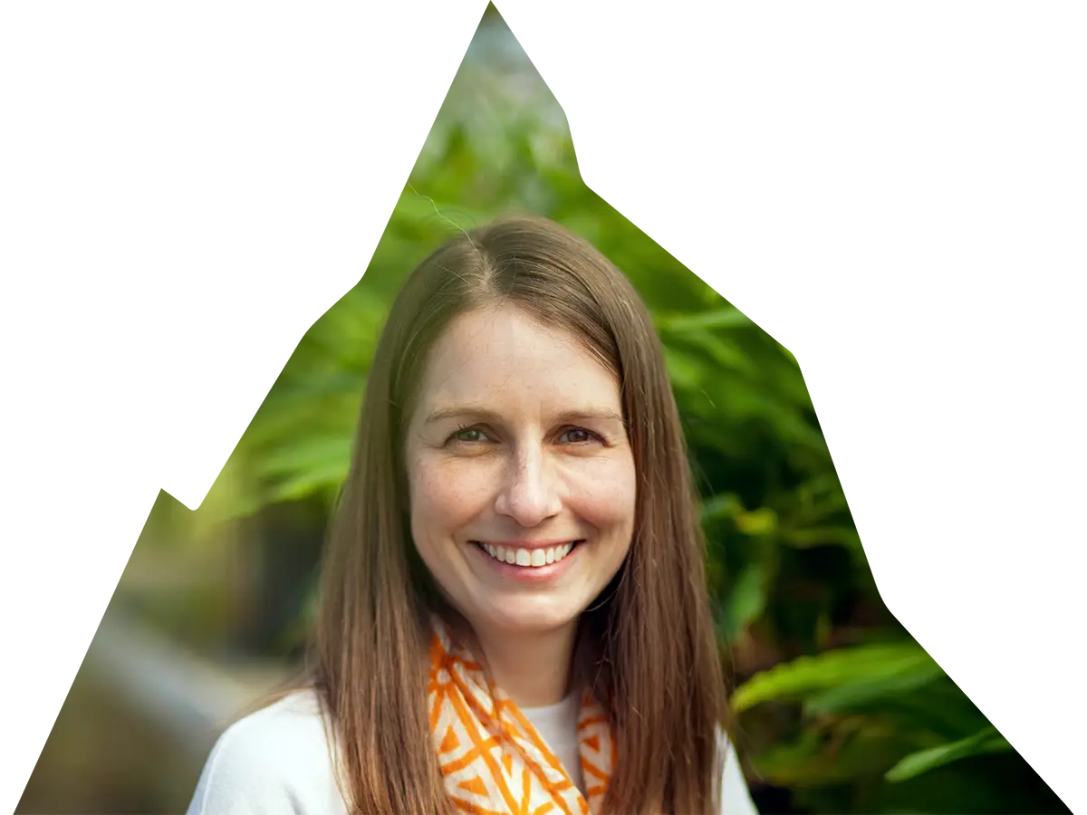 A photo of a woman in a mountain-shaped cutout