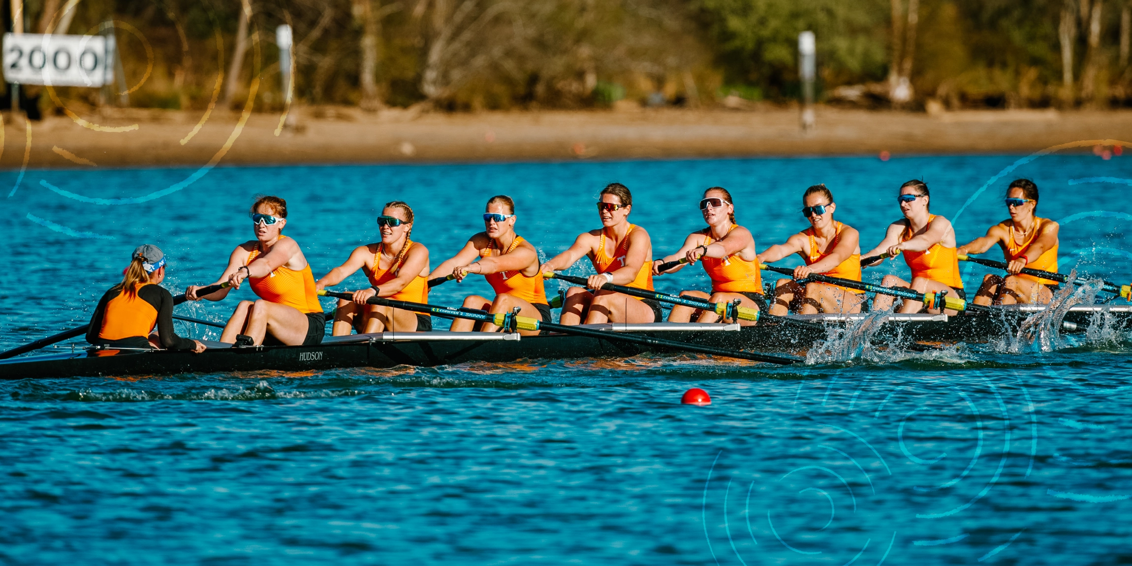 Photo of a rowing team on the water